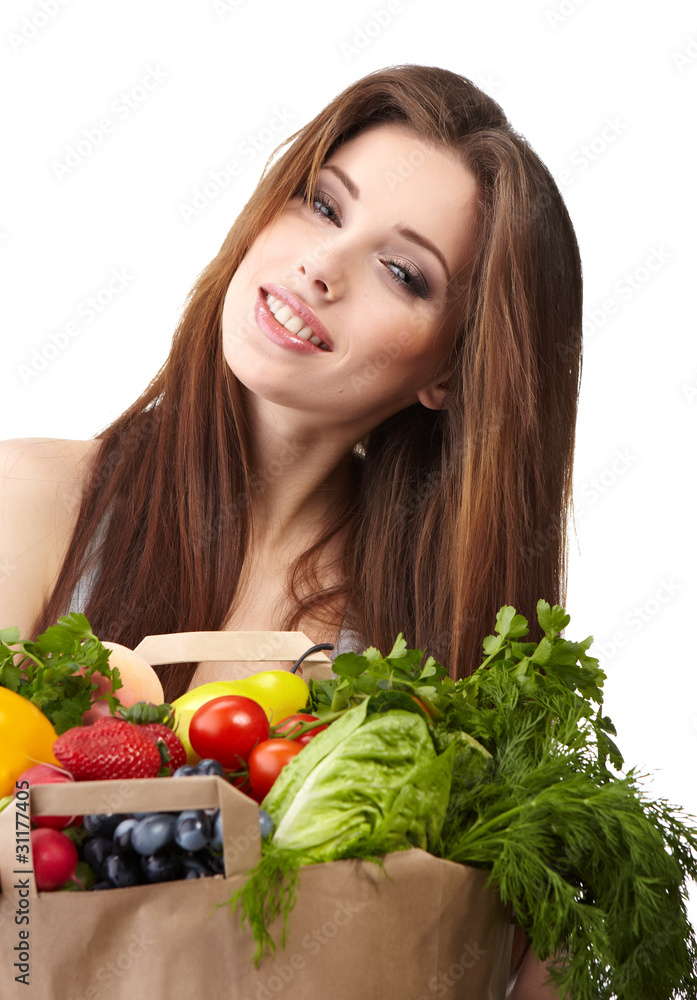 woman holding a bag full of healthy food. shopping . woman holding a bag full of healthy food. shopping .