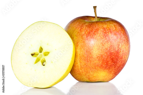 Fresh red apple and cuted green apple.