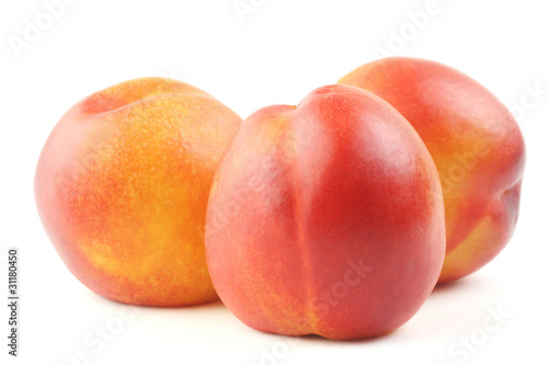 Three whole peaches