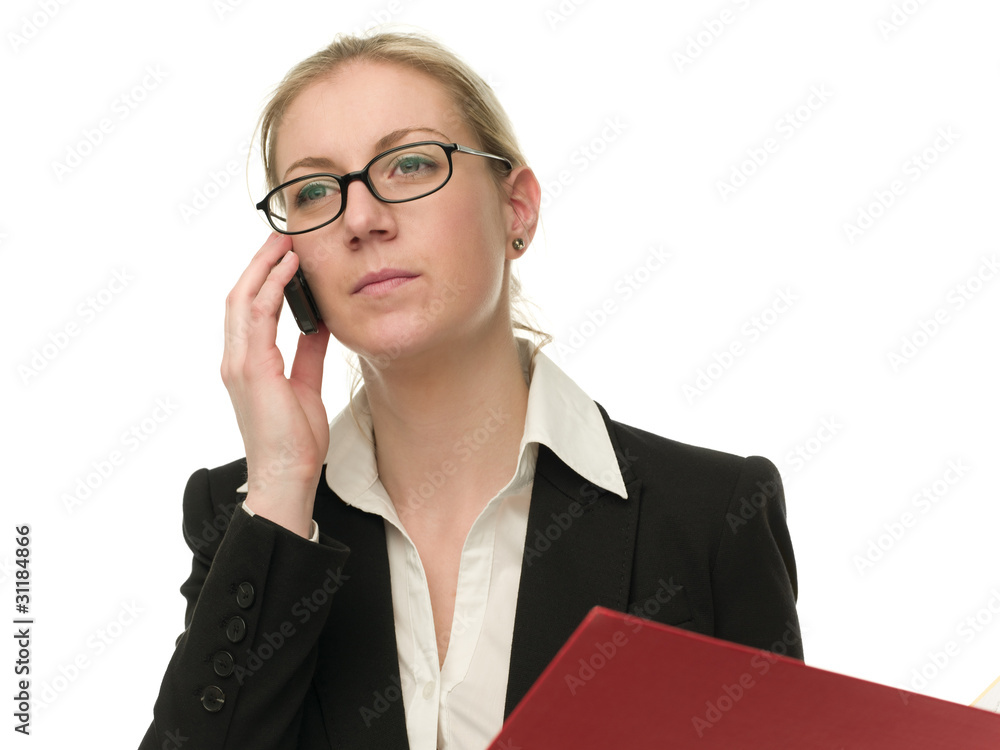 Attractive businesswoman with a cell phone holding a red folder Attractive businesswoman with a cell phone holding a red folder