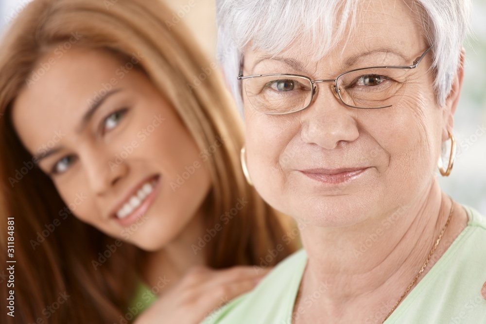 Closeup portrait of happy mother and daughter Closeup portrait of happy mother and daughter