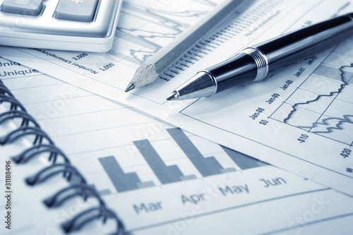 Background of business graph and a pen