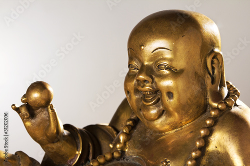 Ancient Figurine Cheerful Hotei.