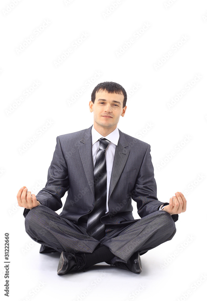 Photo of relaxed businessman meditating over white Photo of relaxed businessman meditating over white