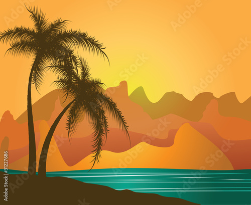 Palm trees against mountains and the sea