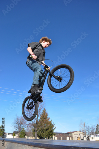 Tween Boy Flying on Bike