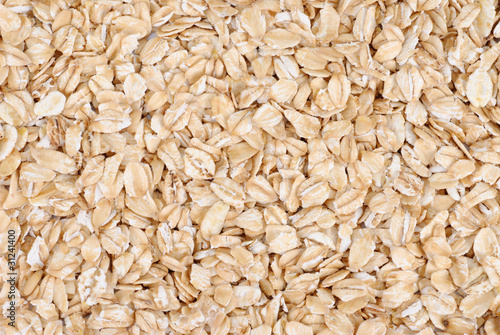 Oatmeal flakes close up as background