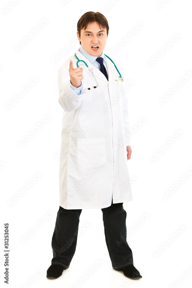 Evil medical doctor shaking his finger isolated on white. Evil medical doctor shaking his finger isolated on white.