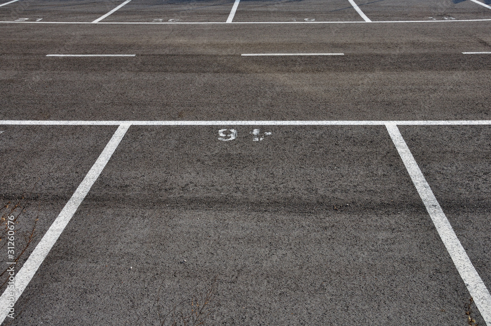 dividing lines asphalt paved parking lot
