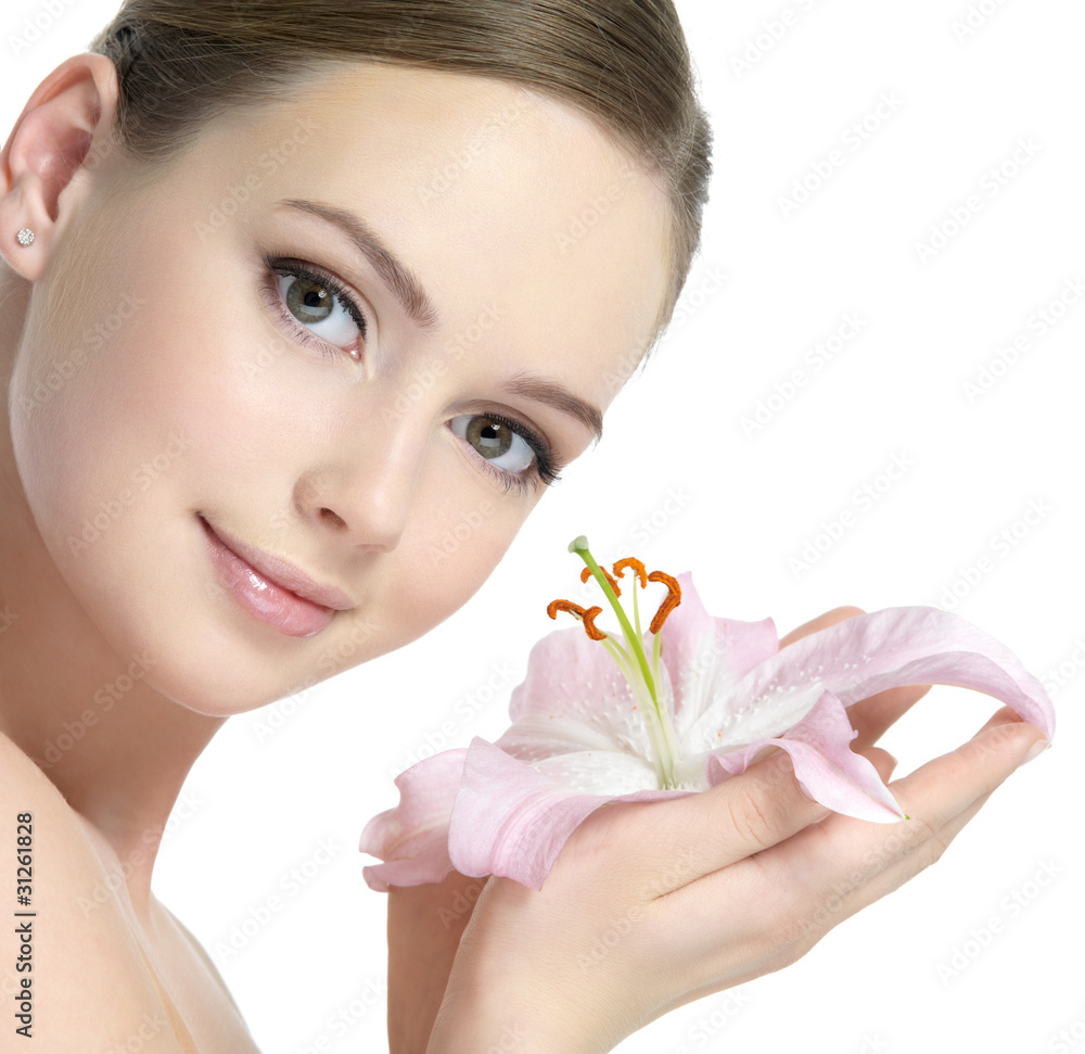 Pretty face of woman with lily Pretty face of woman with lily