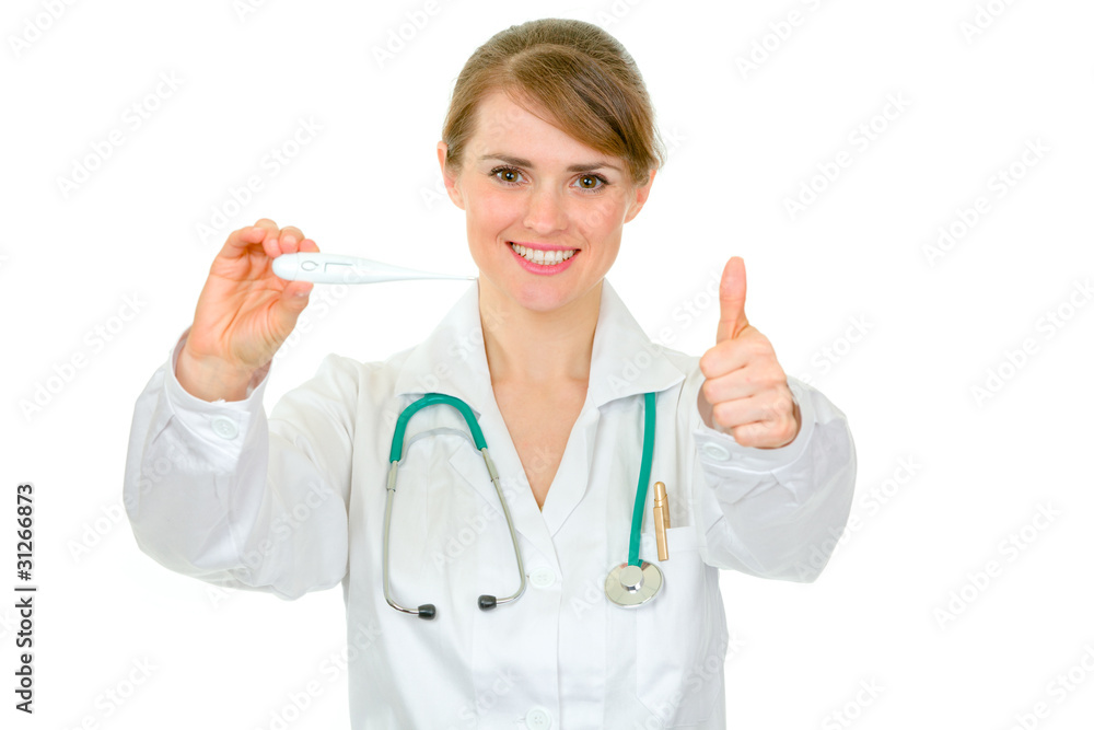Smiling female doctor holding thermometer and showing thumbs up Smiling female doctor holding thermometer and showing thumbs up