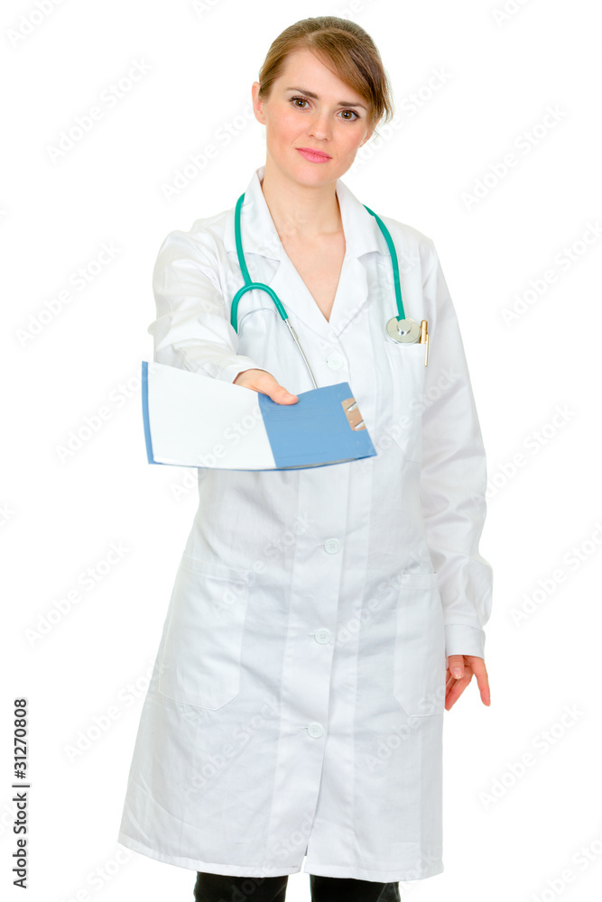 Serious doctor woman giving medical chart isolated on white. Serious doctor woman giving medical chart isolated on white.