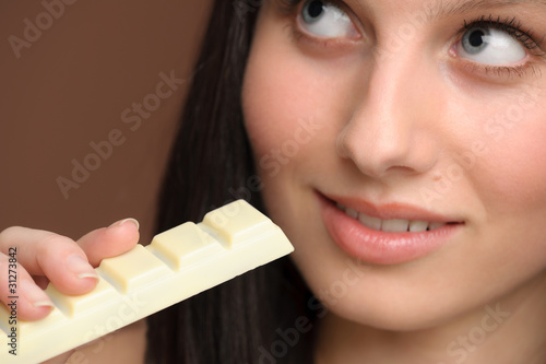 Chocolate - close-up woman enjoy sweets