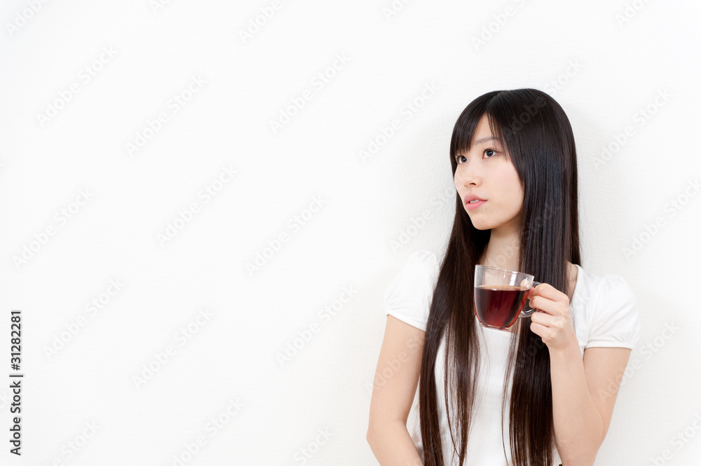 beautiful asian woman with a cup of tea beautiful asian woman with a cup of tea