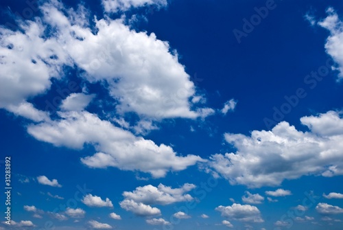 beautiful clouds leaving far on a blue sky