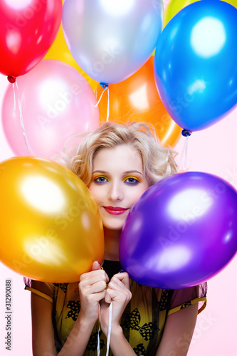 blonde girl with balloons