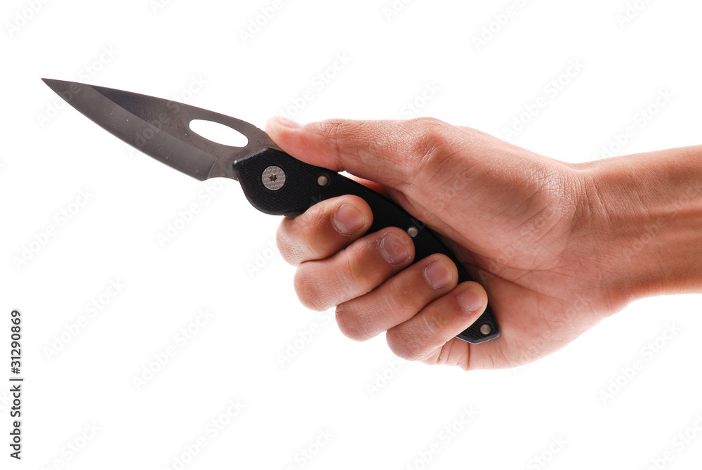Hand Holding a Folding Tactical Knife Hand Holding a Folding Tactical Knife