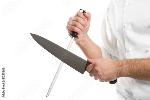 фотографія chef hands with knife sharpen steel tool isolated