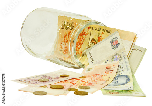 Singapore money in a jar