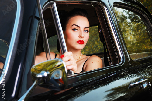 beautiful young woman driving