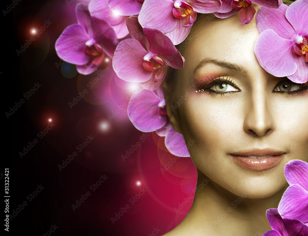 Beautiful Spring Girl With Orchid flowers over black