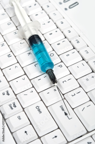 Syringe on keyboard