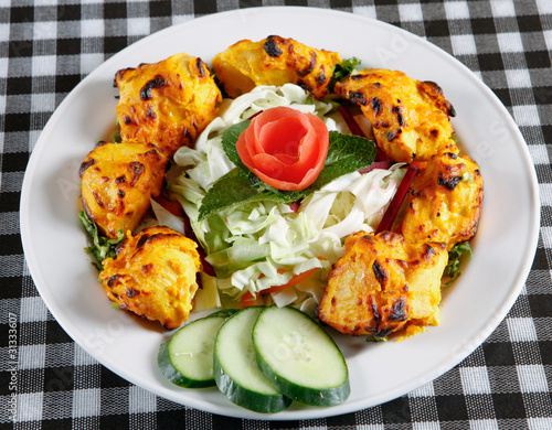 chicken tikka with salad