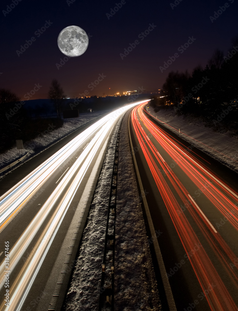 Highway at night with full moon Highway at night with full moon