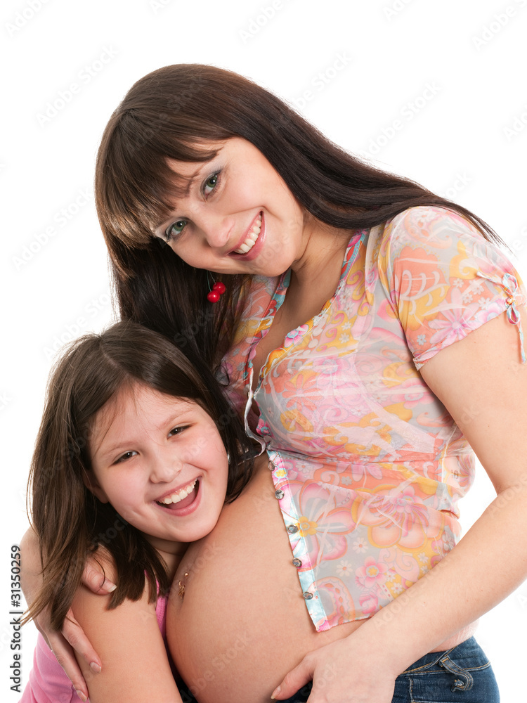 Happy pregnant lady and her elder daughter Happy pregnant lady and her elder daughter