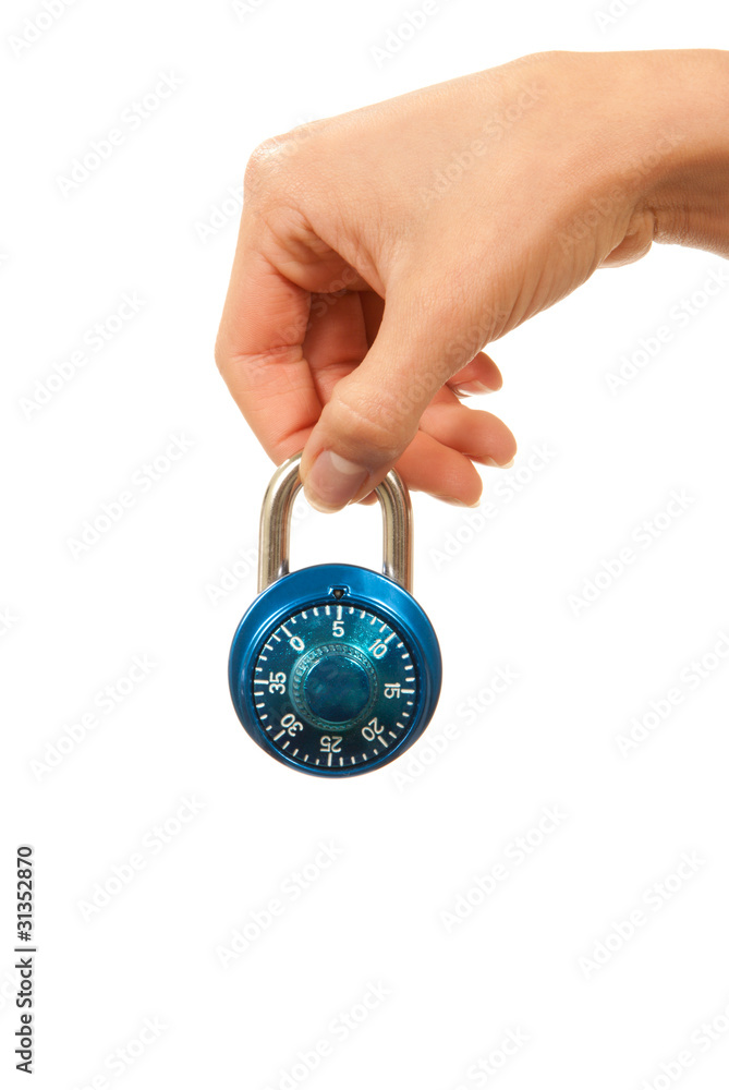 Blue locked Master Combination Dial lock in hand Blue locked Master Combination Dial lock in hand