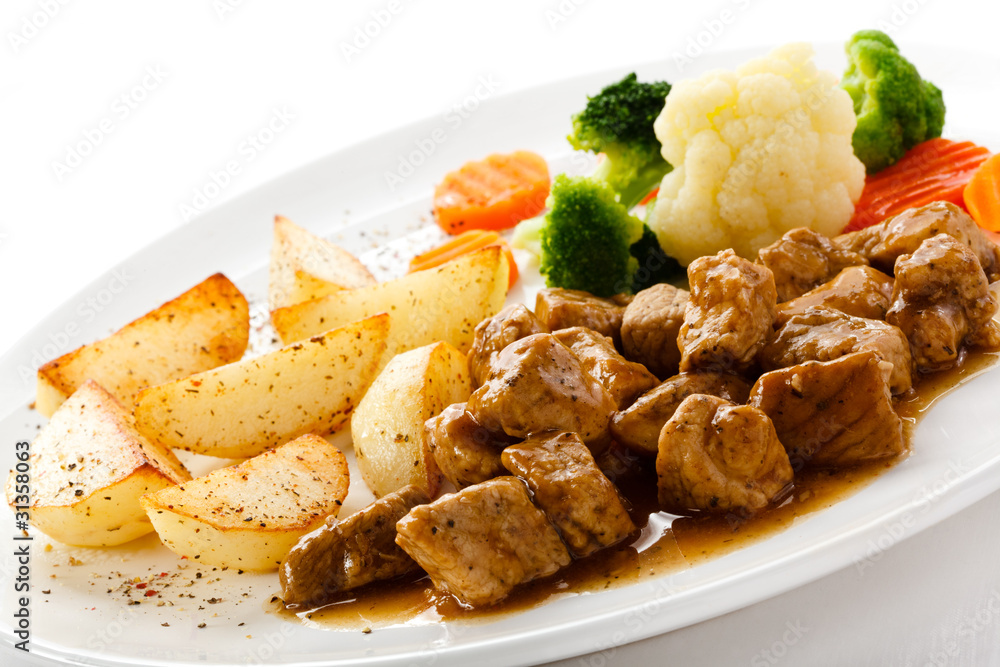 Goulash with roasted potatoes and vegetables Goulash with roasted potatoes and vegetables