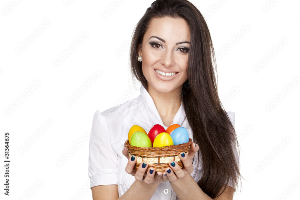Portrait of beautiful female holding basket with Easter eggs Portrait of beautiful female holding basket with Easter eggs