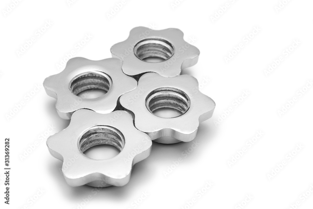 Screws from the dumbbells like the cogwheel isolated Screws from the dumbbells like the cogwheel isolated