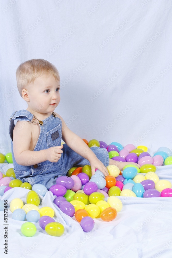 Portrait Of A Baby Surrounded By Plastic Easter Eggs Portrait Of A Baby Surrounded By Plastic Easter Eggs