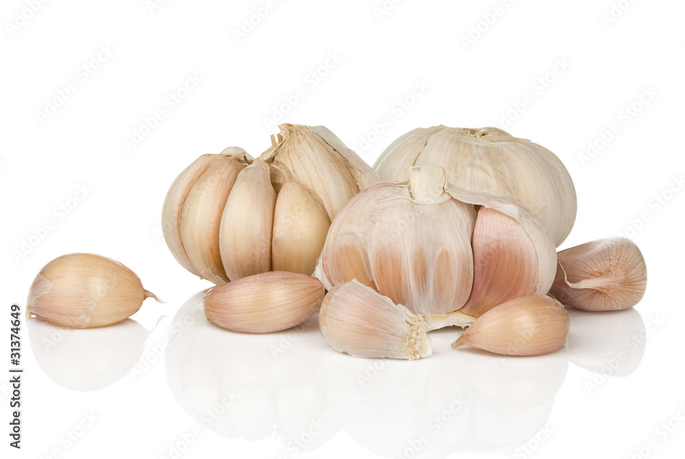 garlics isolated on white garlics isolated on white