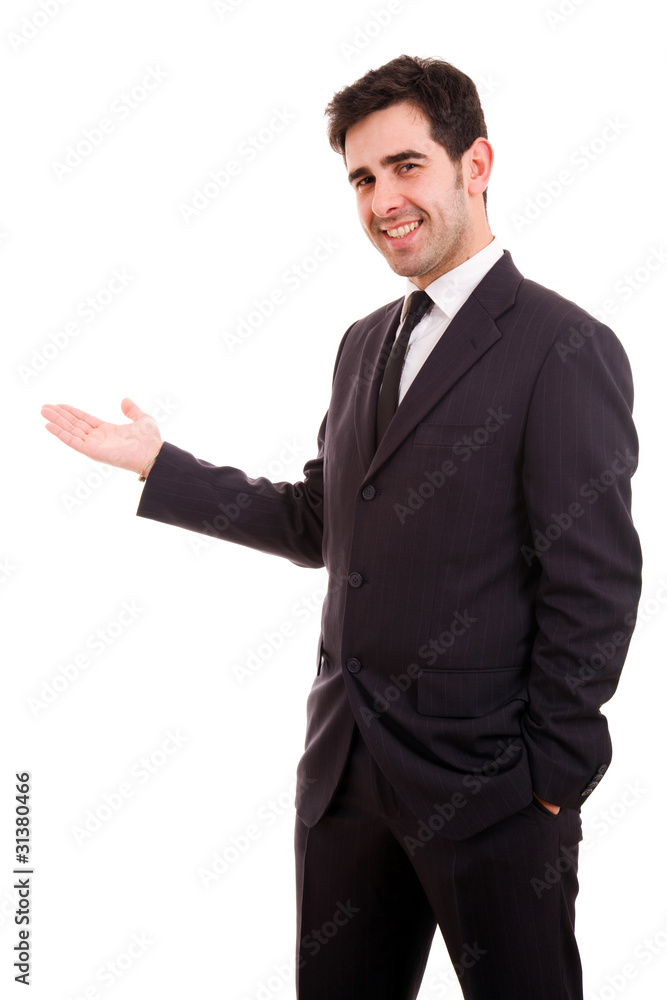 Happy young business man presenting over a white background Happy young business man presenting over a white background