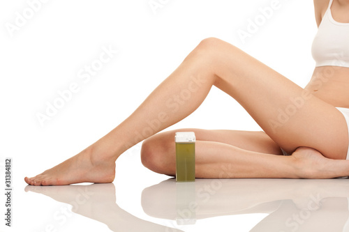 depilating females legs with wax