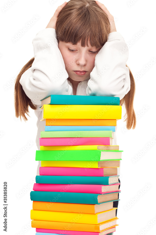 Upset schoolgirl with books