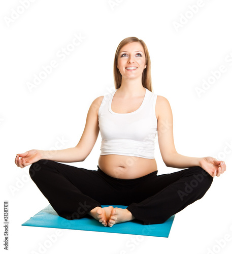 Pregnant woman fitness isolated on white
