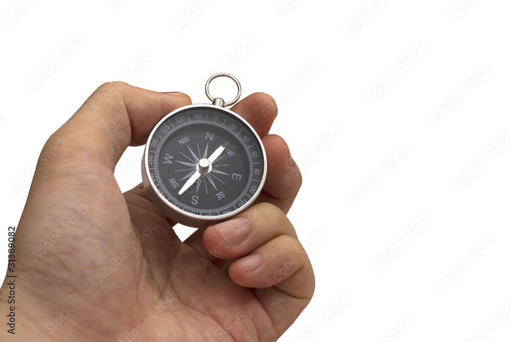hand holding compass isolated on white hand holding compass isolated on white