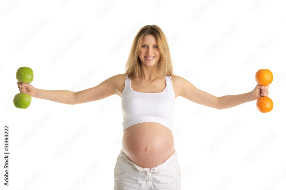 Pregnant woman involved in fitness dumbbells Pregnant woman involved in fitness dumbbells