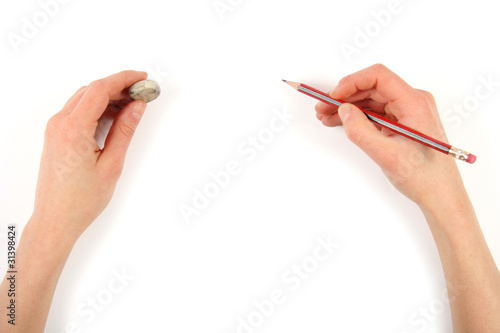 фотографія hands with pencil and erase