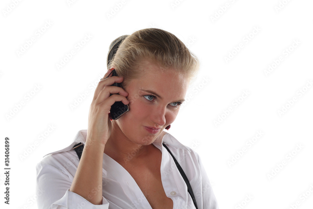 blond woman talking by mobile phone unhappy blond woman talking by mobile phone unhappy