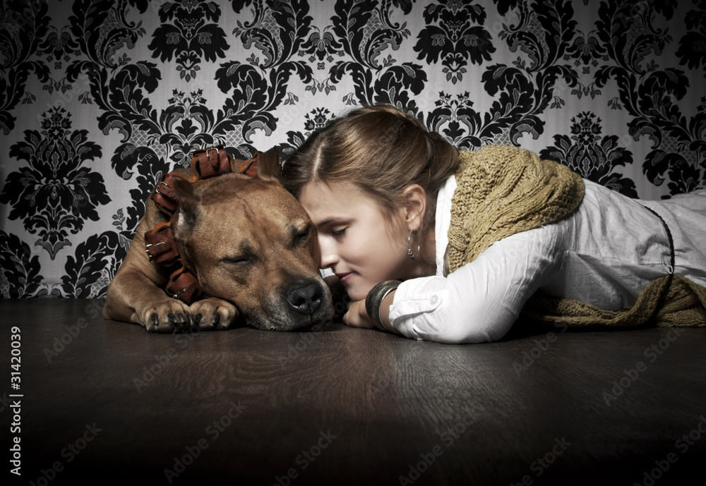 Girl with American Staffordshire Terrier