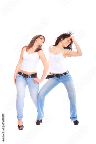 two girls in jeans and white tshirt