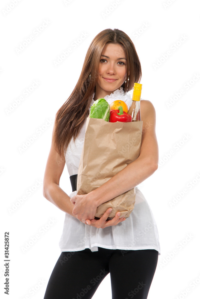 woman hold shopping paper bag full of vegetarian groceries woman hold shopping paper bag full of vegetarian groceries