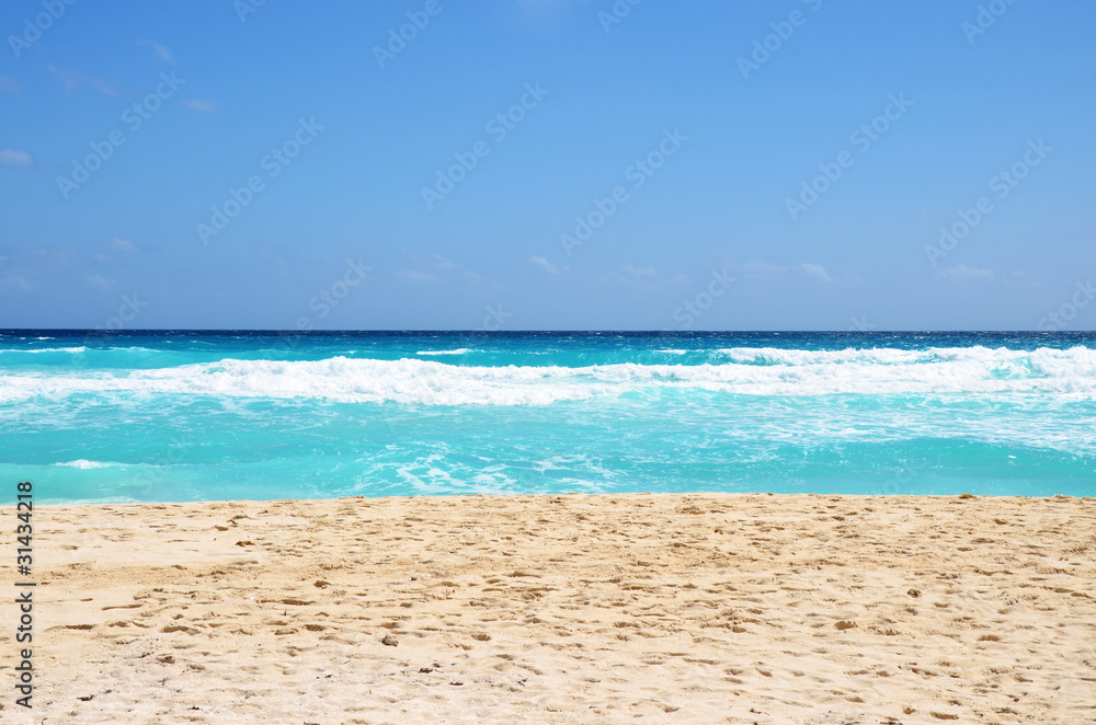 Tropical beach with waves.