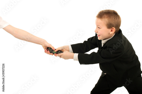 boy struggle for remote control isolated