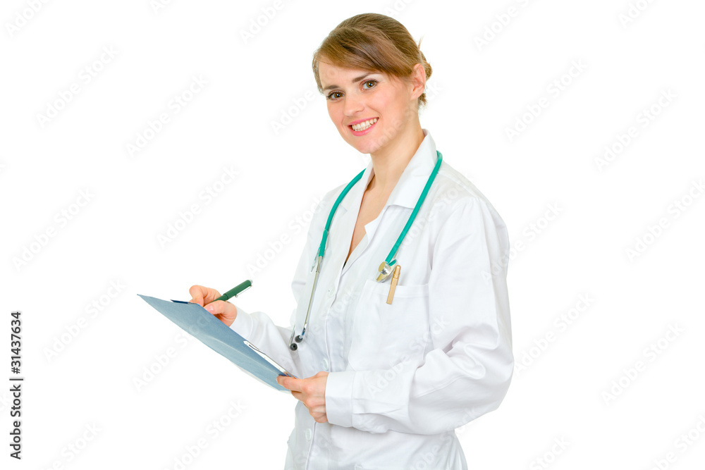 Smiling doctor woman holding medical chart in hand Smiling doctor woman holding medical chart in hand