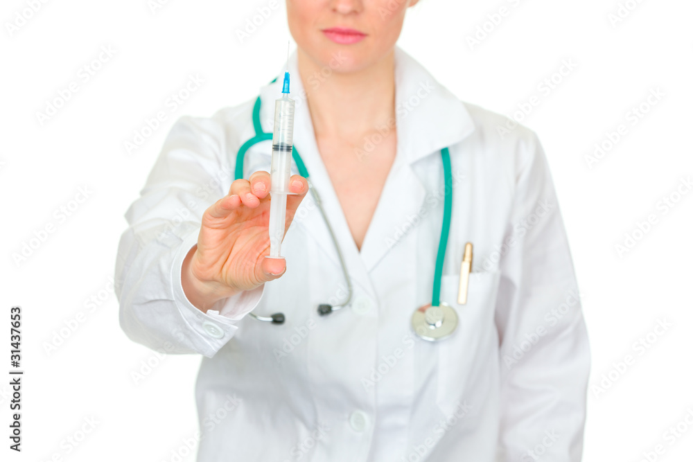 Doctor woman with medical syringe in hands. Close-up. Doctor woman with medical syringe in hands. Close-up.